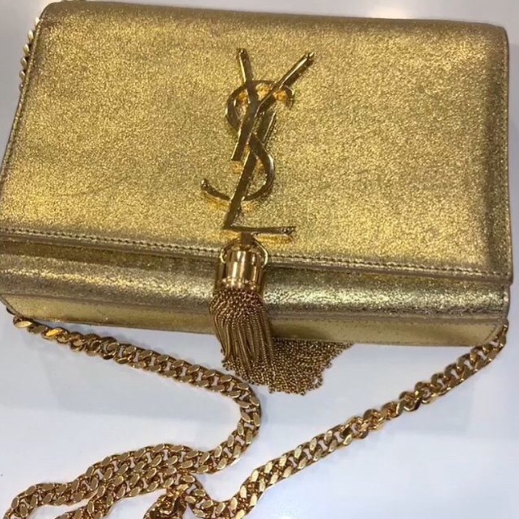 Gold ysl bag shop